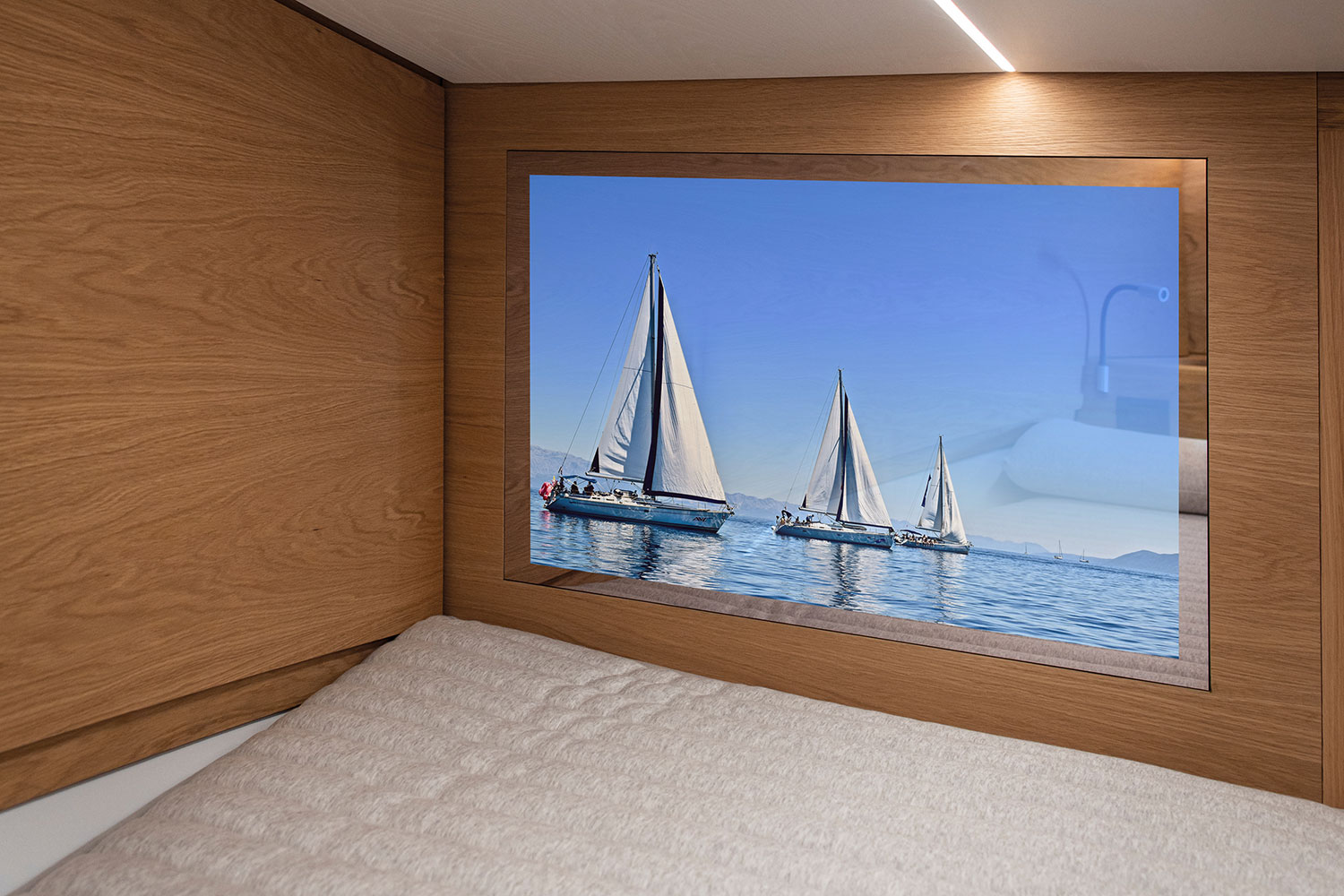 NEOD bespoke mirror television with the screen switched on